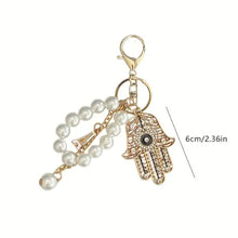 Ojo de la Fortuna™ – Llavero Protector con Cristales y Mano de Fátima