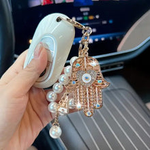 Ojo de la Fortuna™ – Llavero Protector con Cristales y Mano de Fátima